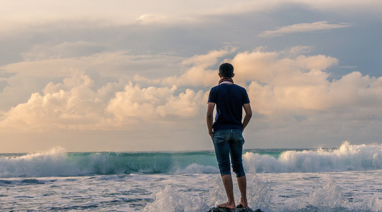 Man with actinic keratosis and ocean and sky